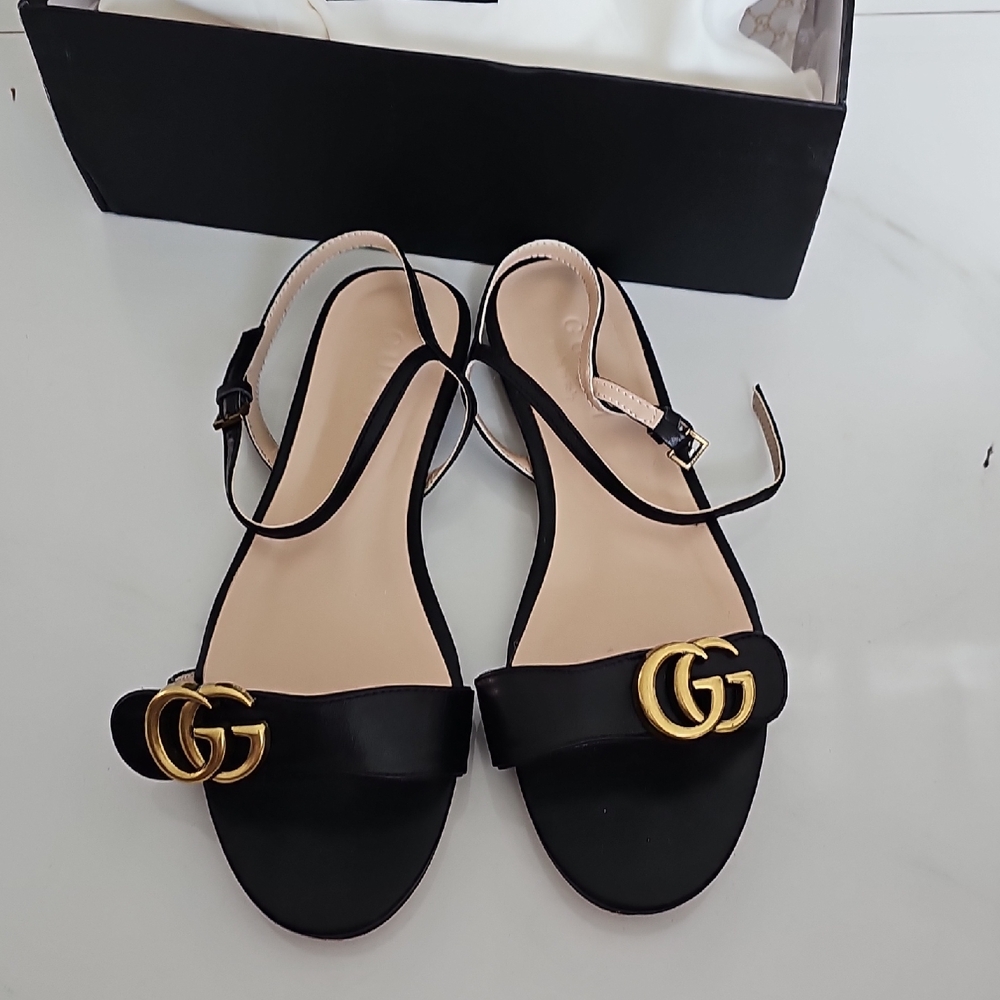 Gucci Black Sandals with Gold Logo Accent